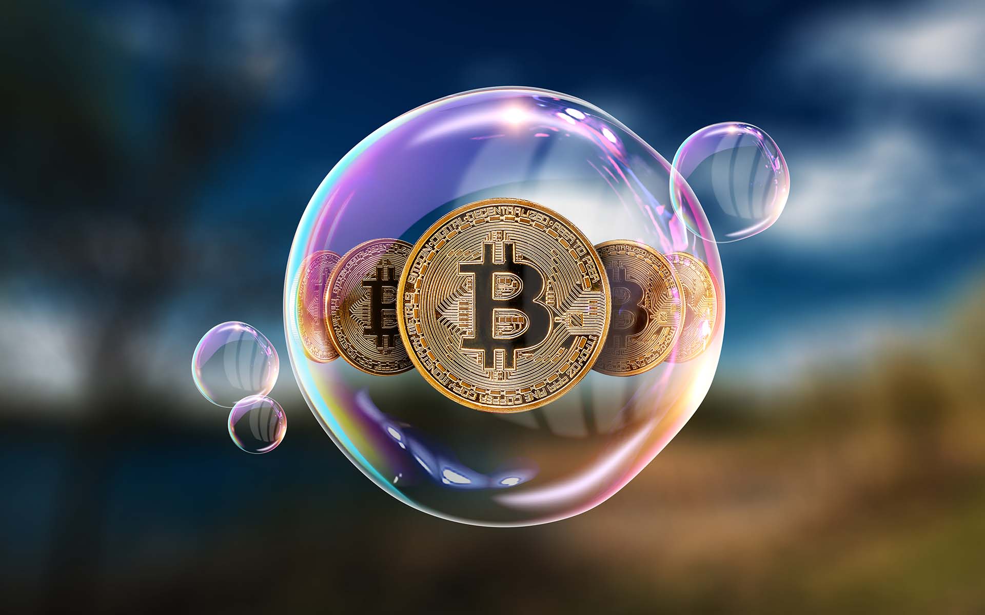 Picture of three bitcoins inside a bubble